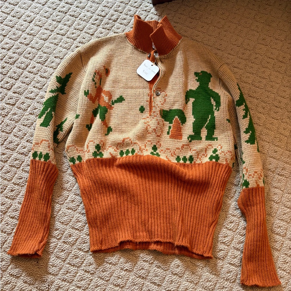 Vintage Knit Sweater with Green Figures and Orange Accents